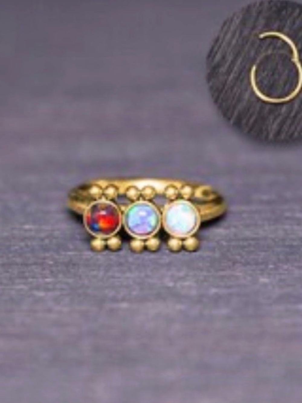 Clicker earring with opals